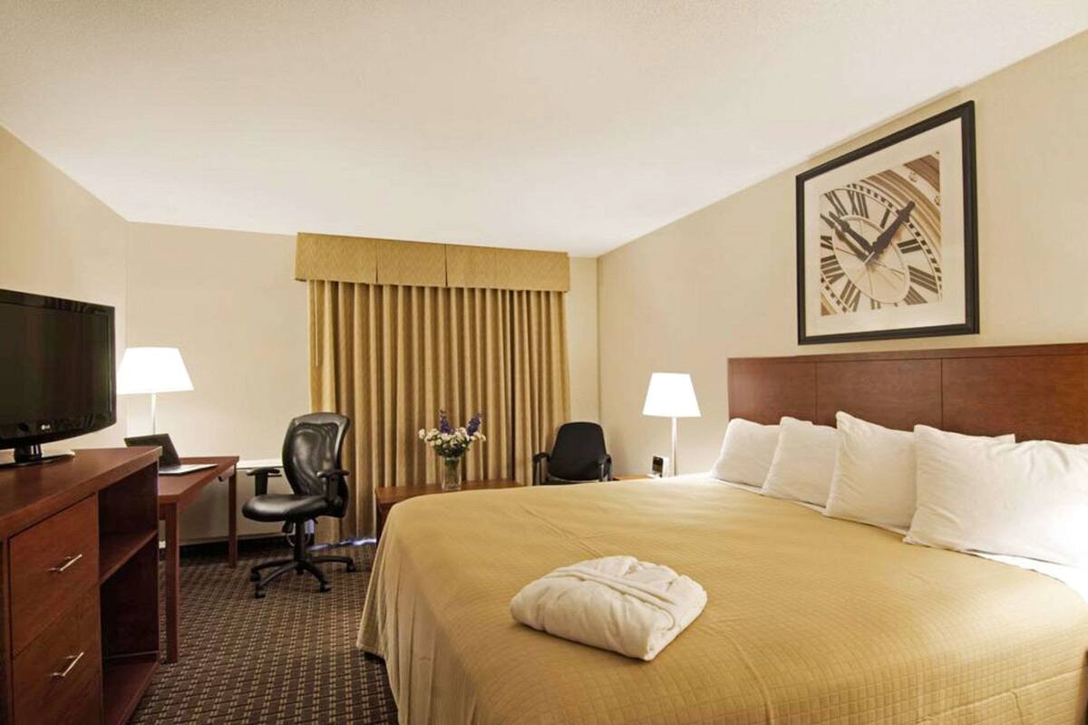 Pillowtop beds, desk, blackout drapes, iron/ironing board