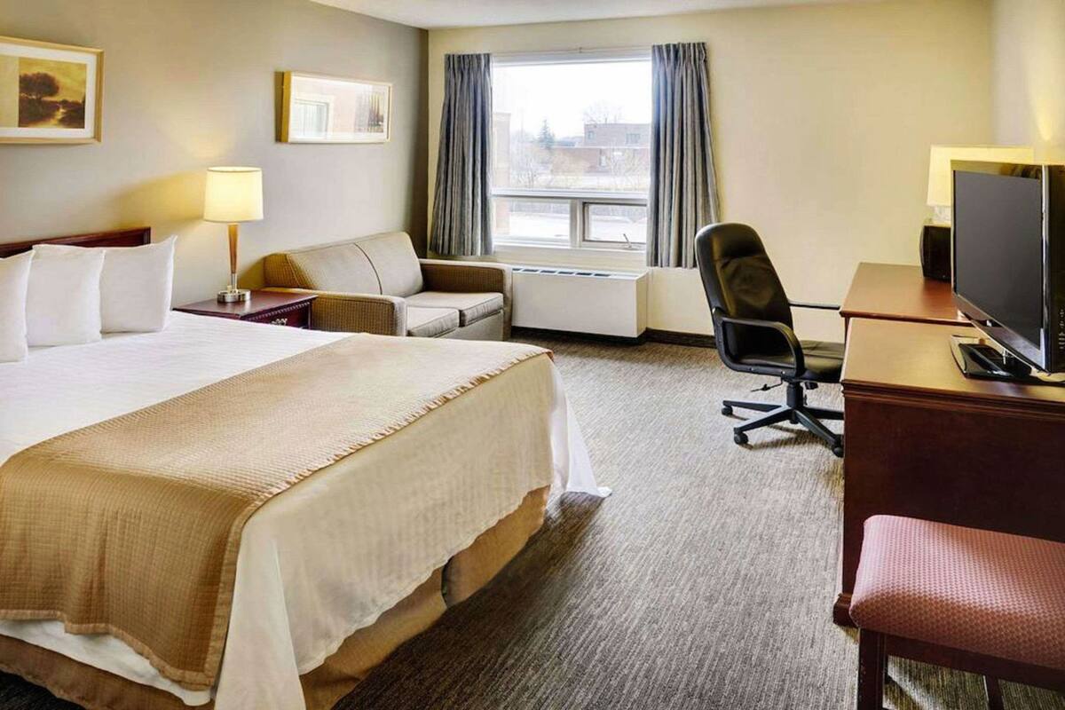 Pillowtop beds, desk, blackout drapes, iron/ironing board