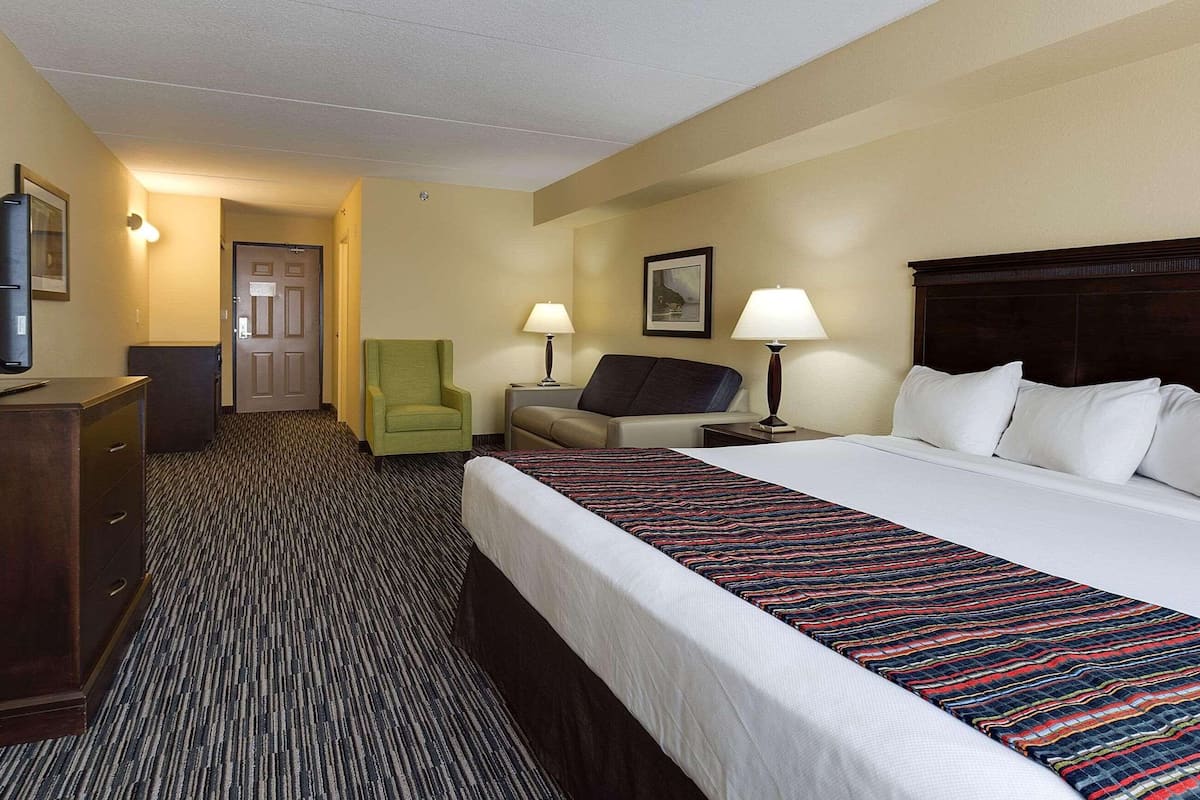 studio suite, 1 king bed with sofa bed, non smoking | premium bedding, desk, laptop workspace, blackout curtains