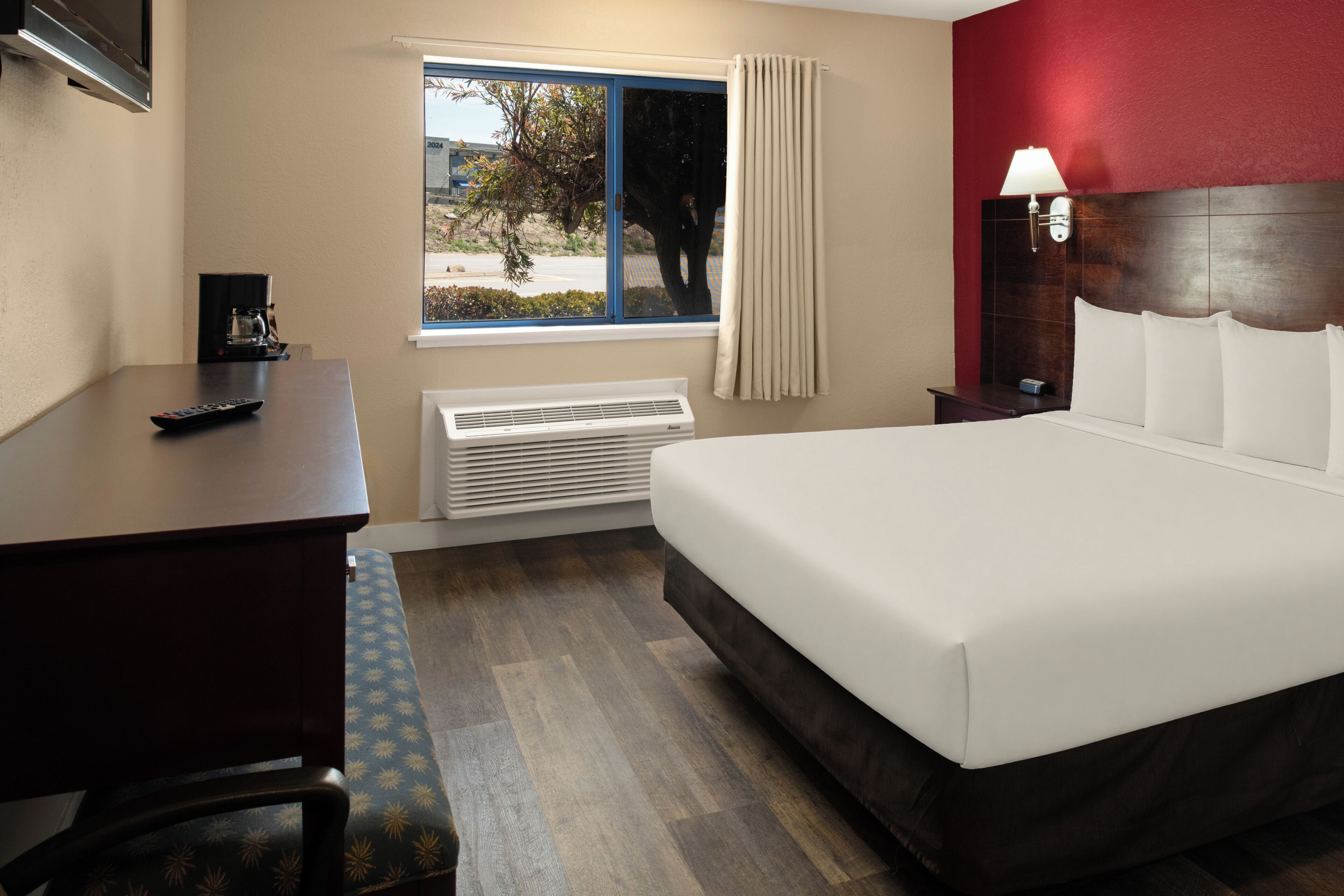 Premium bedding, individually furnished, desk, laptop workspace