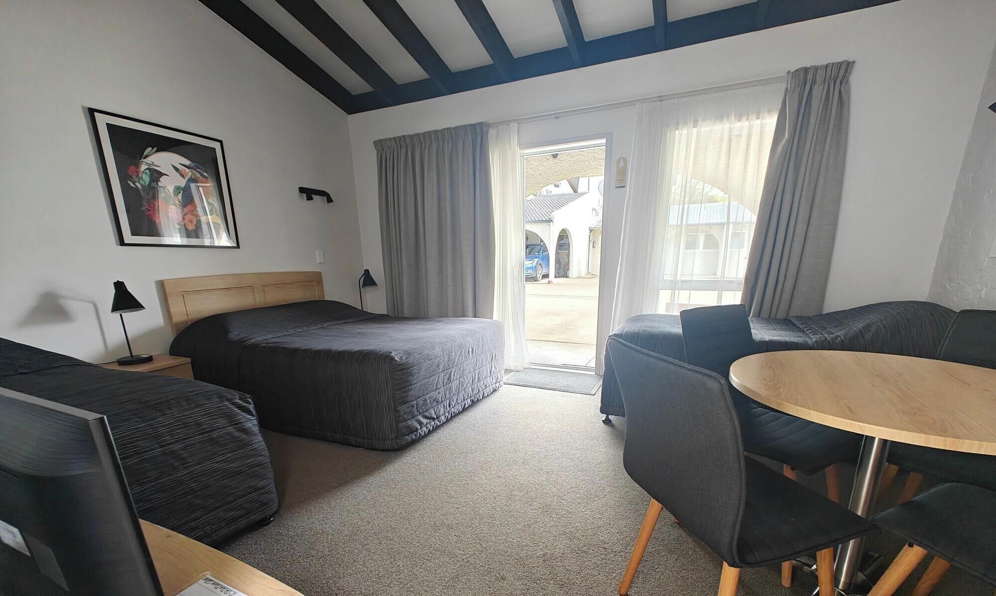 Standard Quadruple Room, Multiple Beds | Premium bedding, individually decorated, iron/ironing board, travel crib