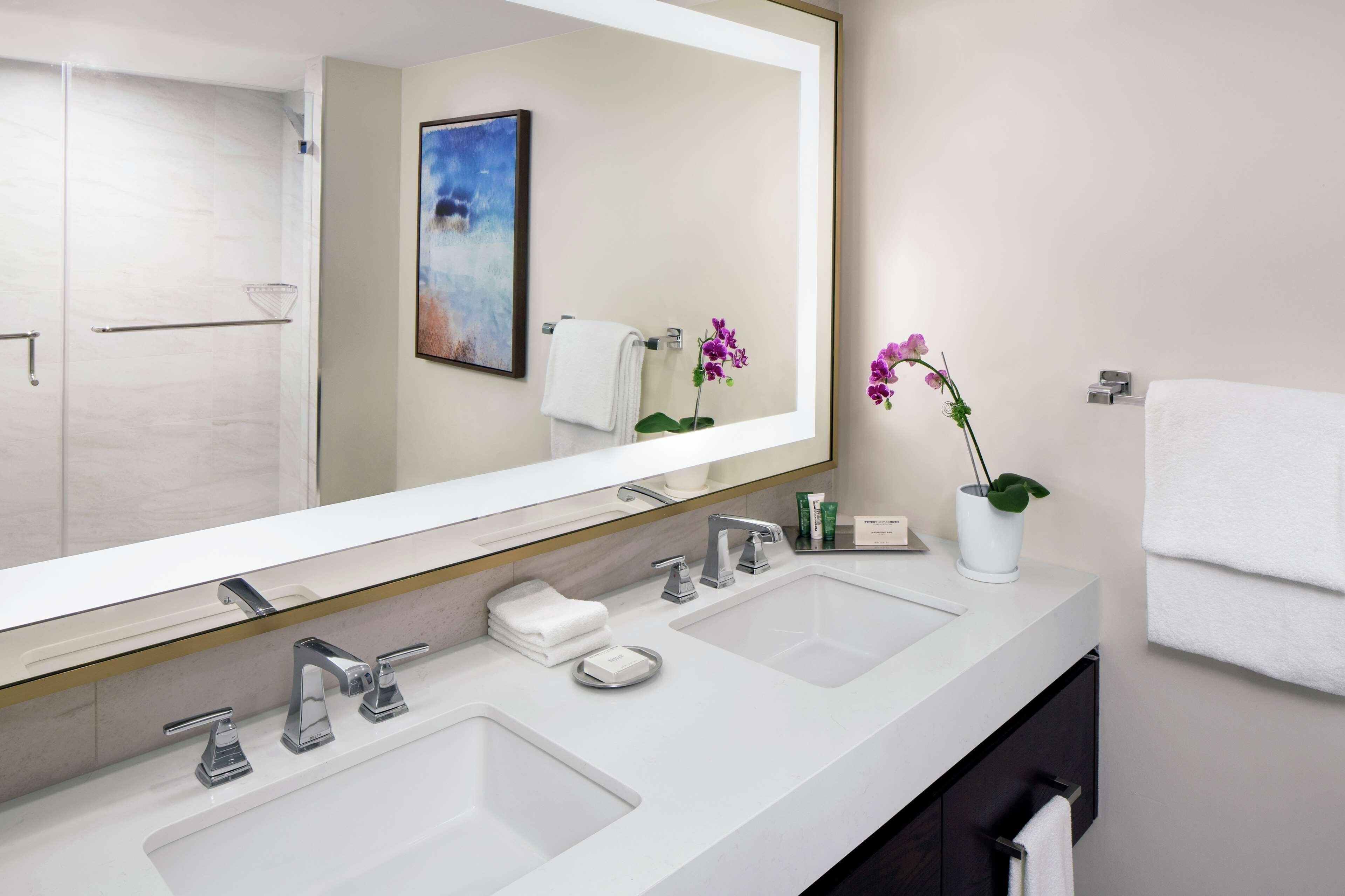 Bathroom | Hydromassage showerhead, designer toiletries, hair dryer, towels
