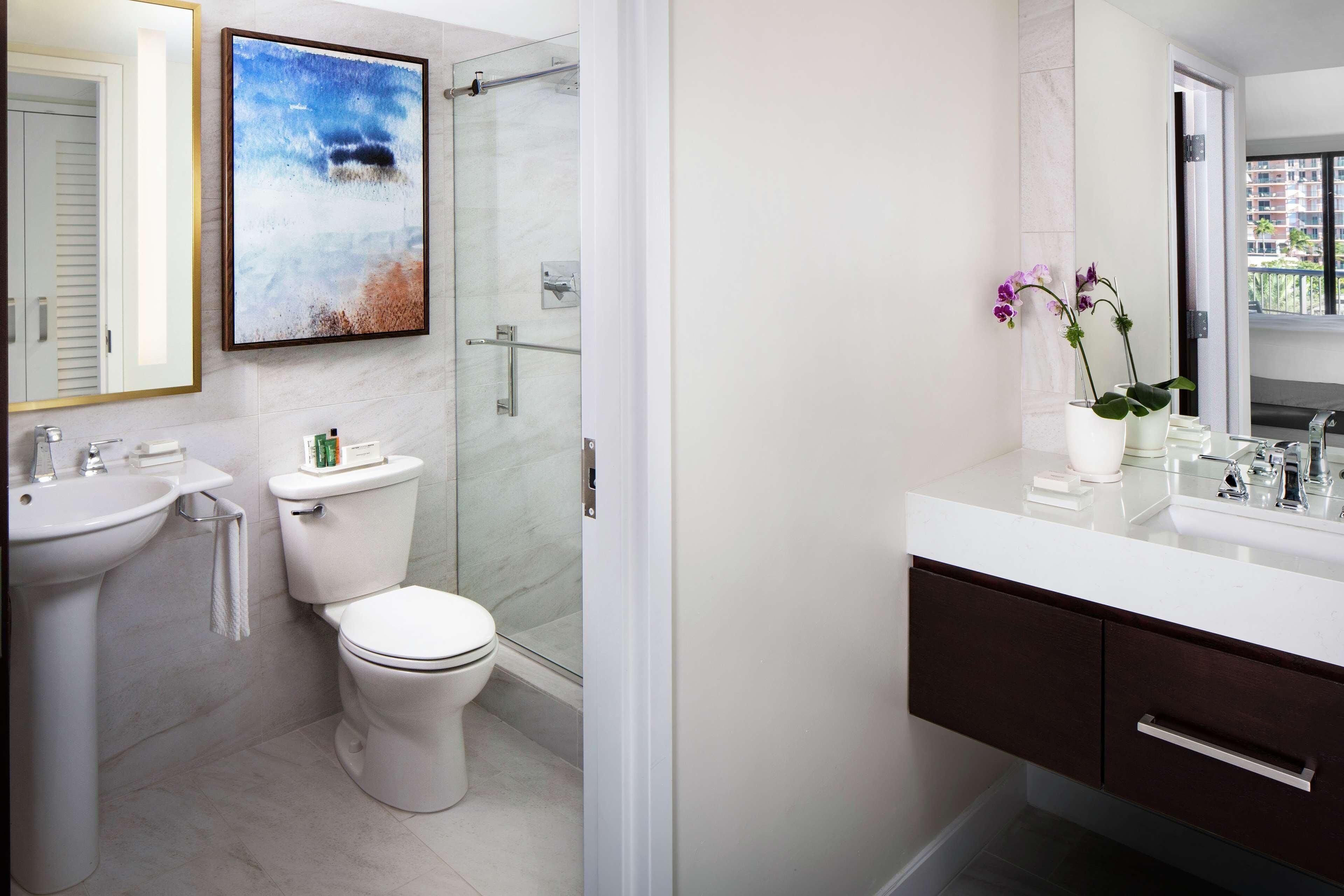 Hydromassage showerhead, designer toiletries, hair dryer, towels