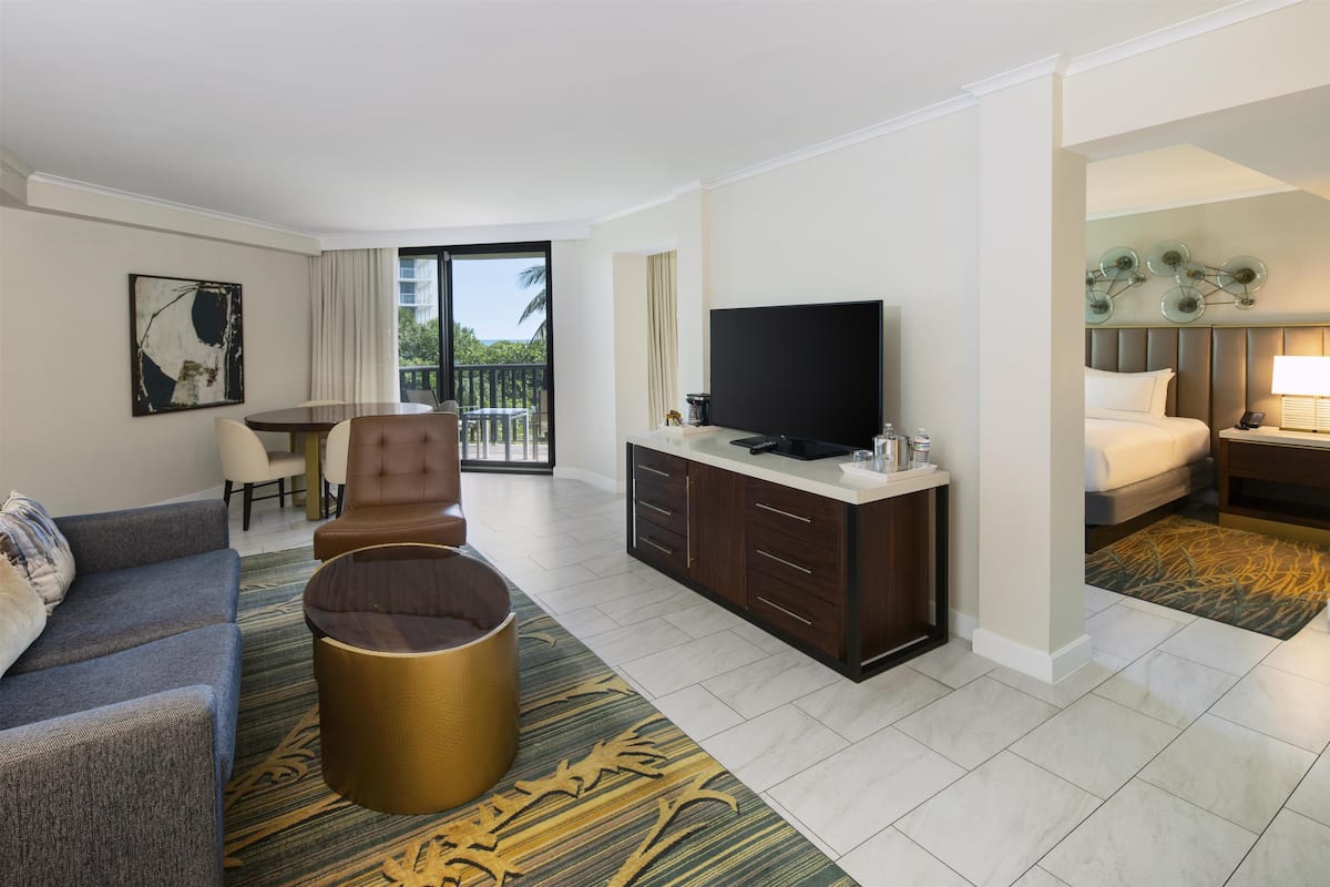 Suite, 1 King Bed, Ocean View, Mobility Accessible (Bathtub) | Living area | 32-inch plasma TV with cable channels, TV, pay movies