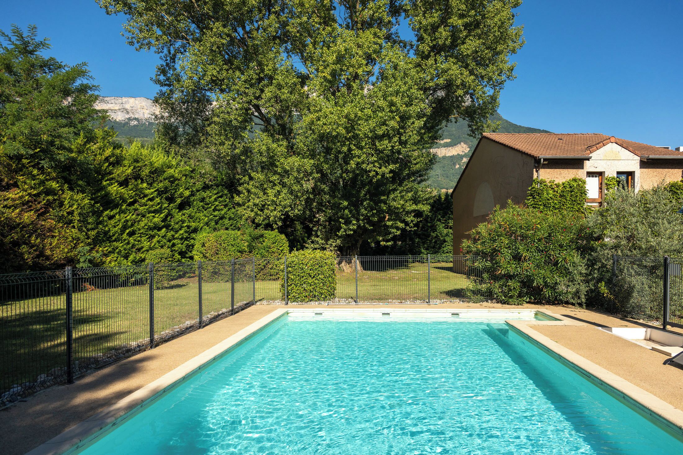 seasonal outdoor pool, pool umbrellas, pool loungers