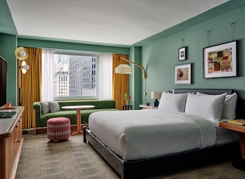 Hypo-allergenic bedding, in-room safe, laptop workspace, blackout drapes at Romer Hells Kitchen