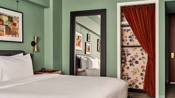 Hypo-allergenic bedding, in-room safe, laptop workspace