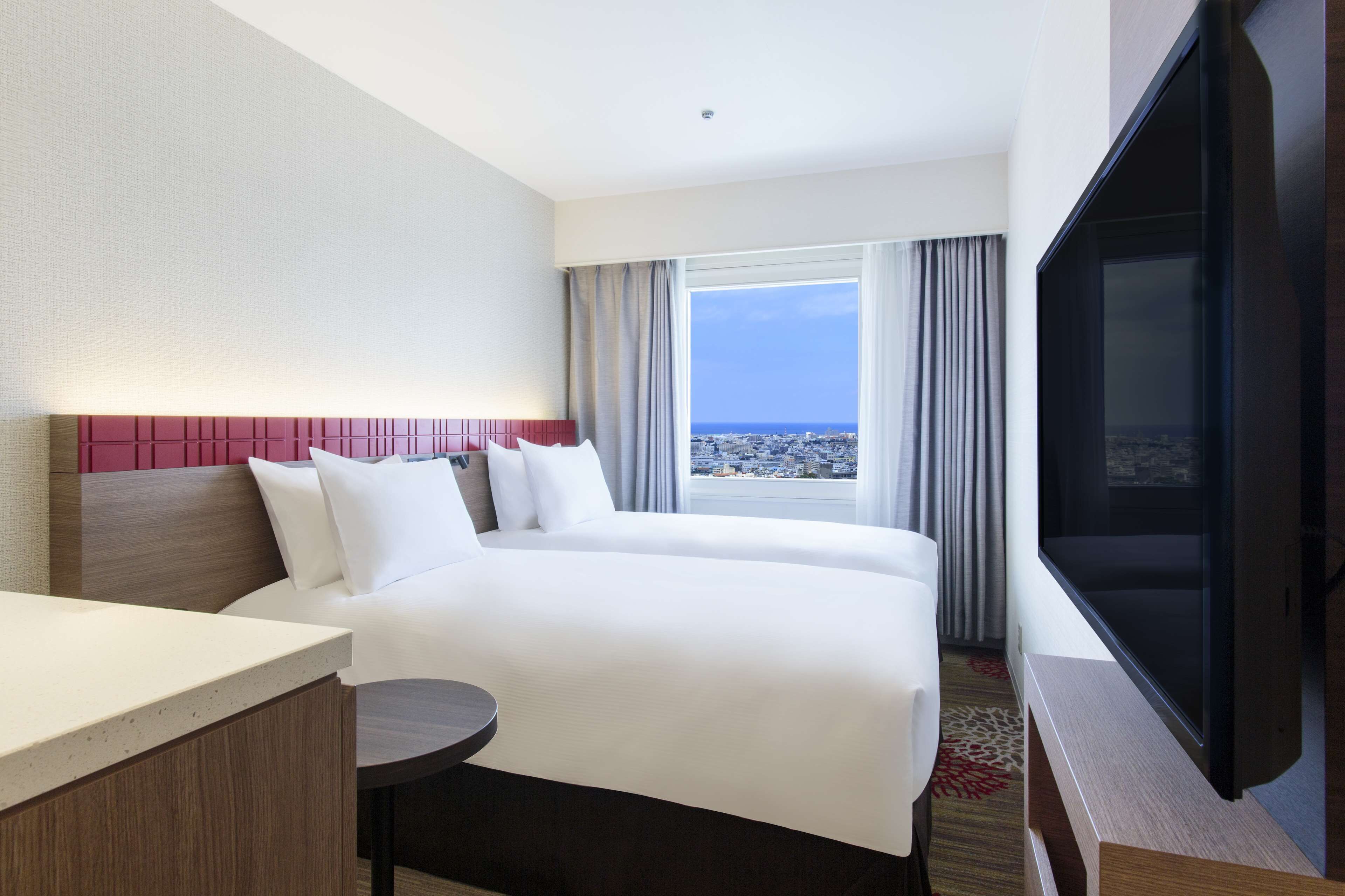 twin room compact | in-room safe, blackout curtains, soundproofing, free cots/infant beds