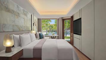 A modern hotel room with a large bed, a flat-screen TV, a nightstand, and a view of a pool and palm trees.