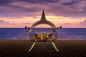Beach nearby, white sand, beach umbrellas, beach towels