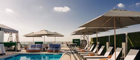 Outdoor pool, cabanas (surcharge), sun loungers