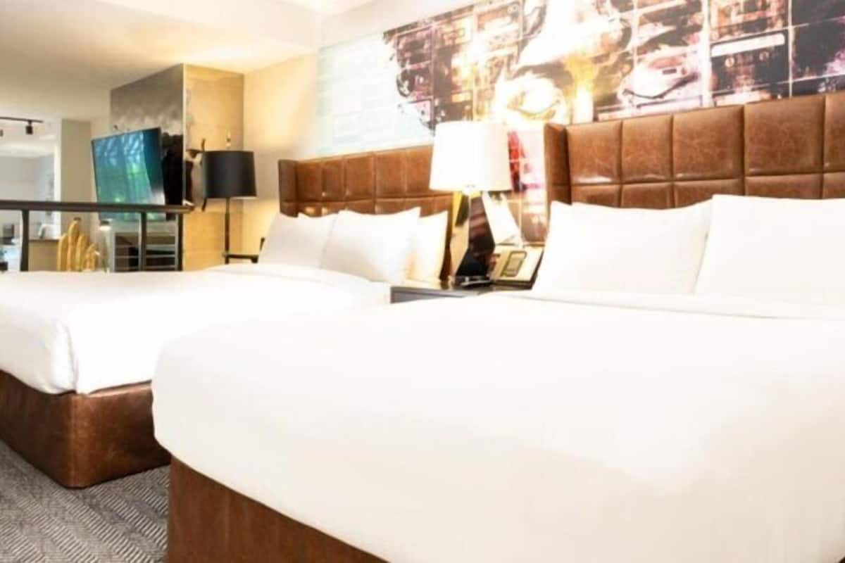 Signature Suite, 2 Queen Beds, Balcony | Egyptian cotton sheets, premium bedding, pillowtop beds, in-room safe