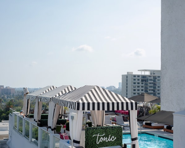 Outdoor pool, pool cabanas (surcharge), pool loungers