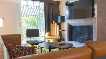 65-inch flat-screen TV with satellite channels, TV, fireplace