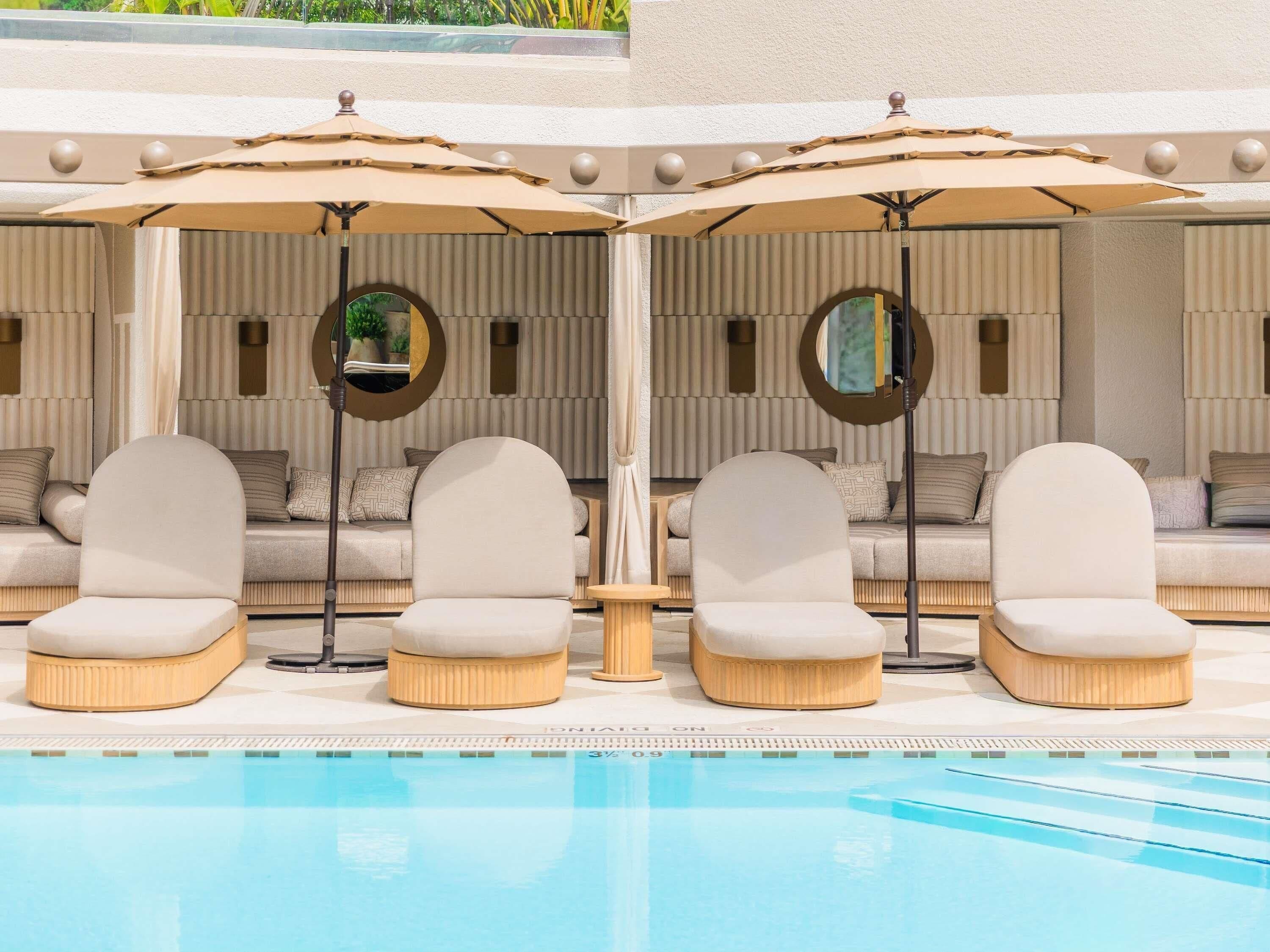 Outdoor pool, open 6 AM to 9 PM, sun loungers