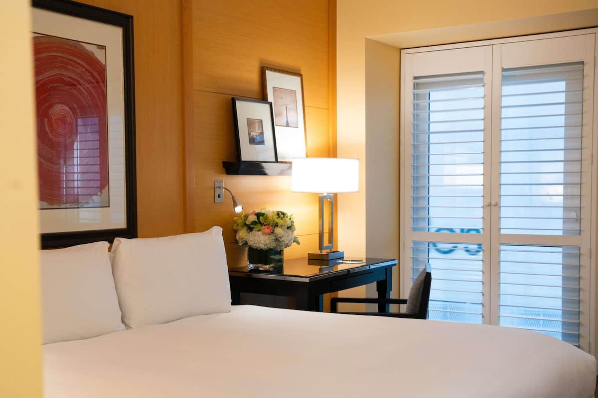 Premium bedding, down comforters, minibar, in-room safe