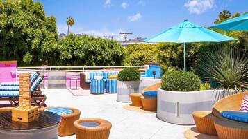 Outdoor pool, open 6 AM to 9 PM, sun loungers