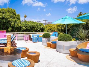 Outdoor pool, open 6 AM to 9 PM, sun loungers