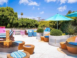 Outdoor pool, open 6 AM to 9 PM, sun loungers