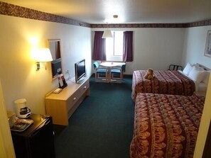 Pillow-top beds, desk, iron/ironing board, rollaway beds