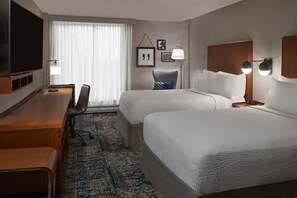 Premium bedding, pillowtop beds, desk, laptop workspace