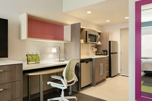 Desk, laptop workspace, blackout drapes, free cribs/infant beds