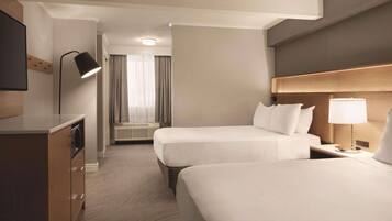 Hypo-allergenic bedding, pillowtop beds, in-room safe, desk