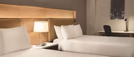 Hypo-allergenic bedding, pillow-top beds, in-room safe, desk