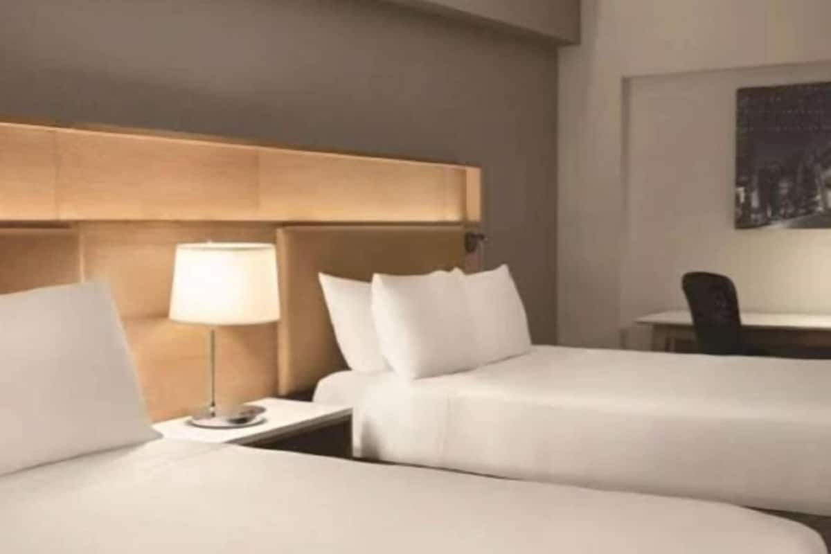 Hypo-allergenic bedding, pillowtop beds, in-room safe, desk