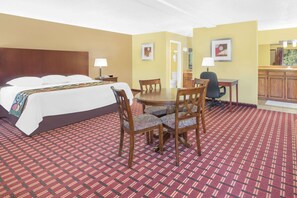 Suite, 1 King Bed, Non Smoking | Laptop workspace, iron/ironing board, free WiFi, bed sheets