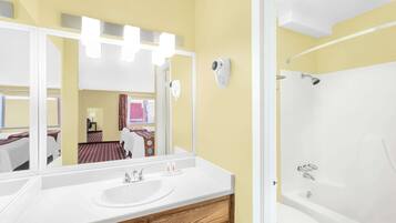 Suite, 2 Queen Beds, Non Smoking | Bathroom | Combined shower/tub, hair dryer, towels