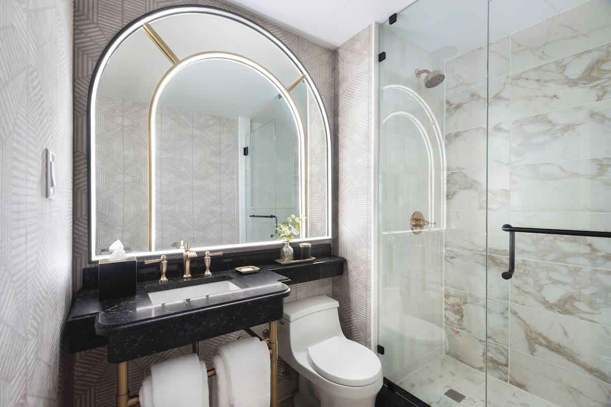 combined shower/bathtub, free toiletries, hair dryer, bathrobes