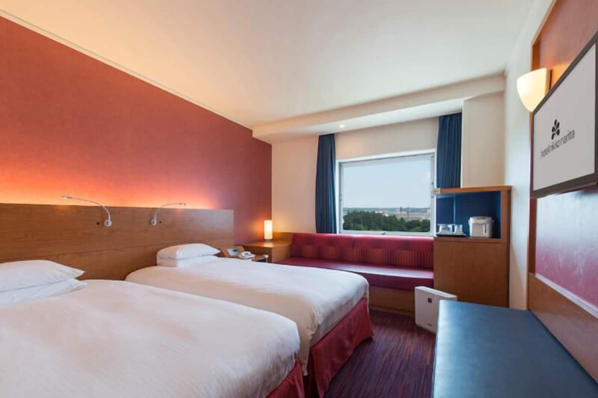 Desk, blackout drapes, soundproofing, iron/ironing board