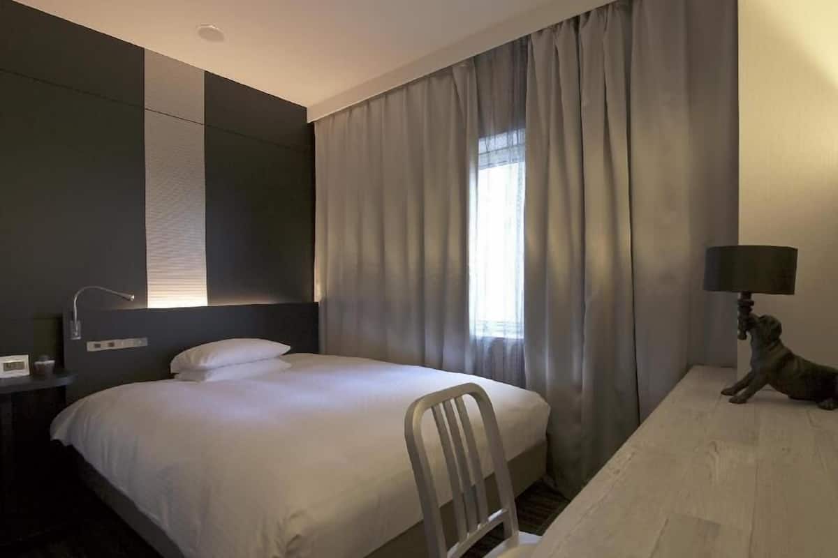 Desk, blackout drapes, soundproofing, iron/ironing board