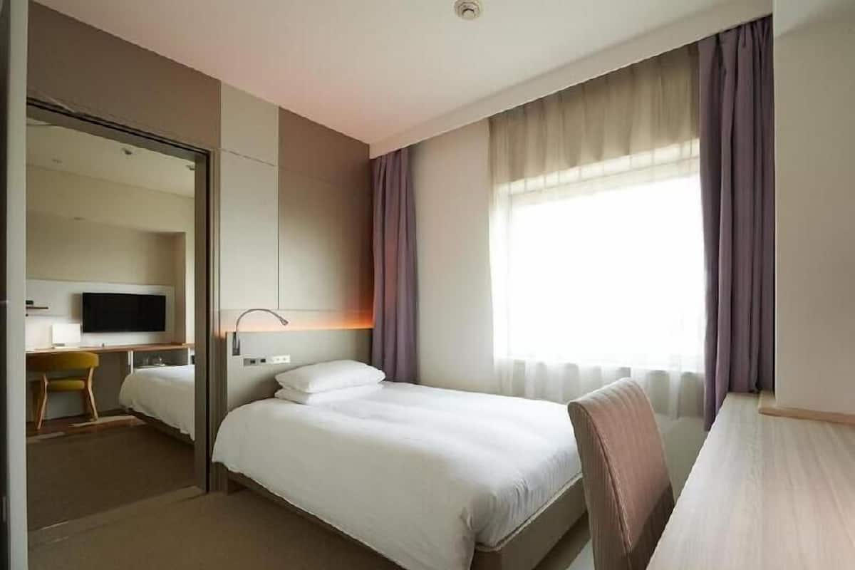 Desk, blackout drapes, soundproofing, iron/ironing board