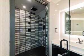 Designer toiletries, hair dryer, towels, soap