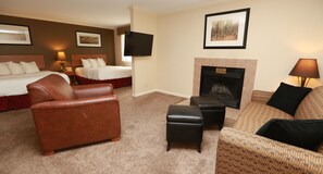 Studio Double Queen Suite with Sofa Sleeper | Living area | Flat-screen TV