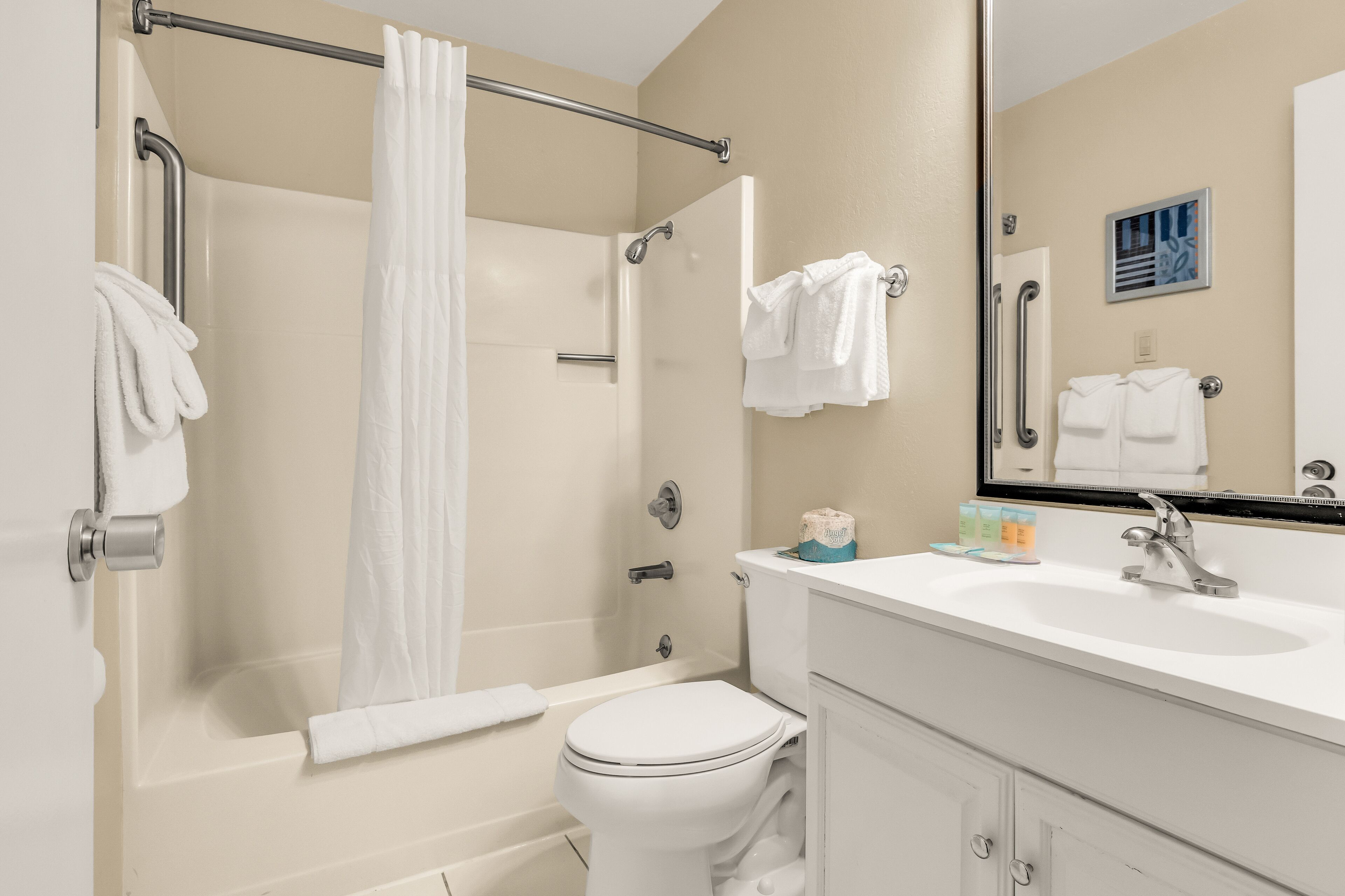 deluxe room, 2 queen beds | desk, laptop workspace, iron/ironing board, free wifi