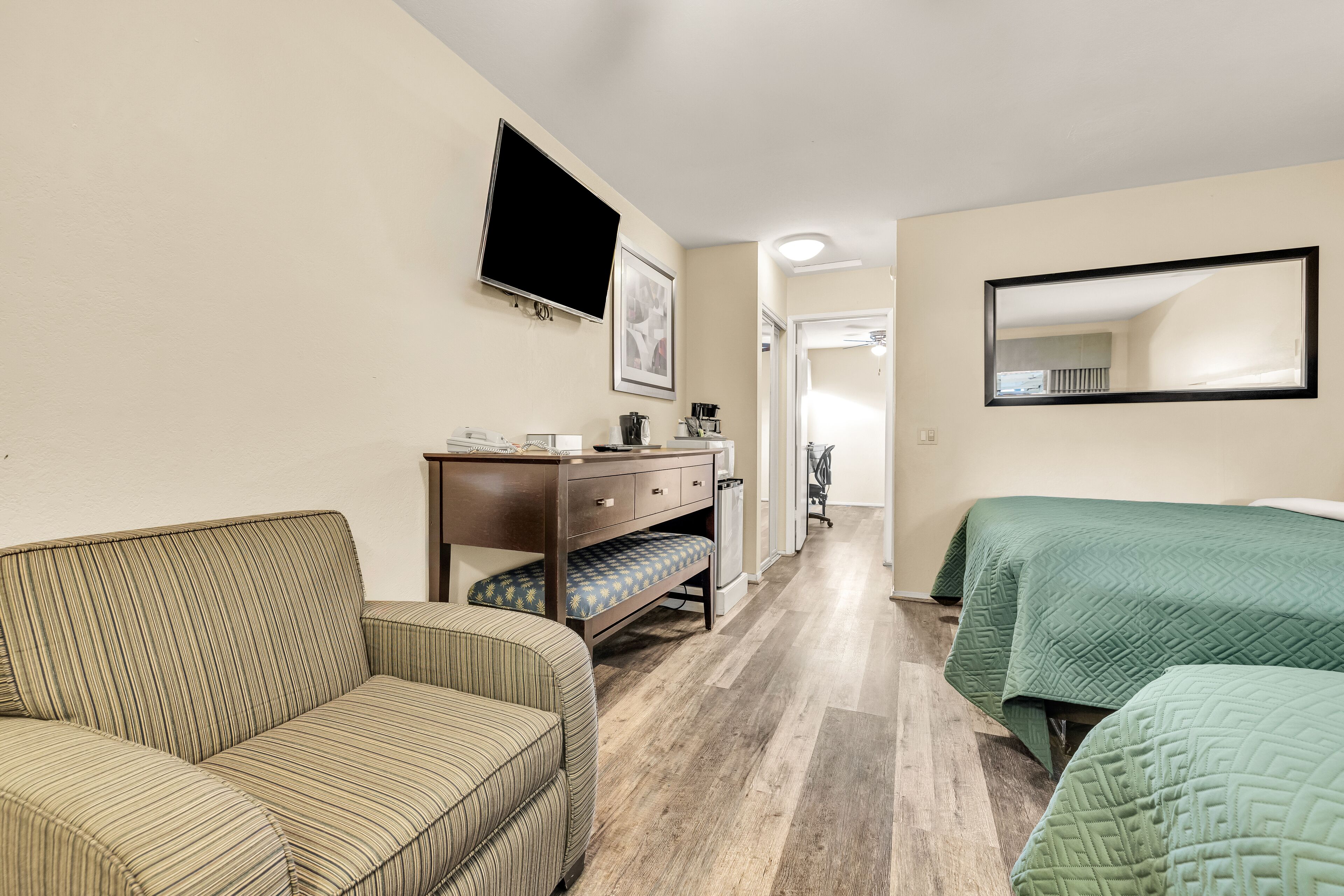 deluxe room, 3 queen beds | desk, laptop workspace, iron/ironing board, free wifi