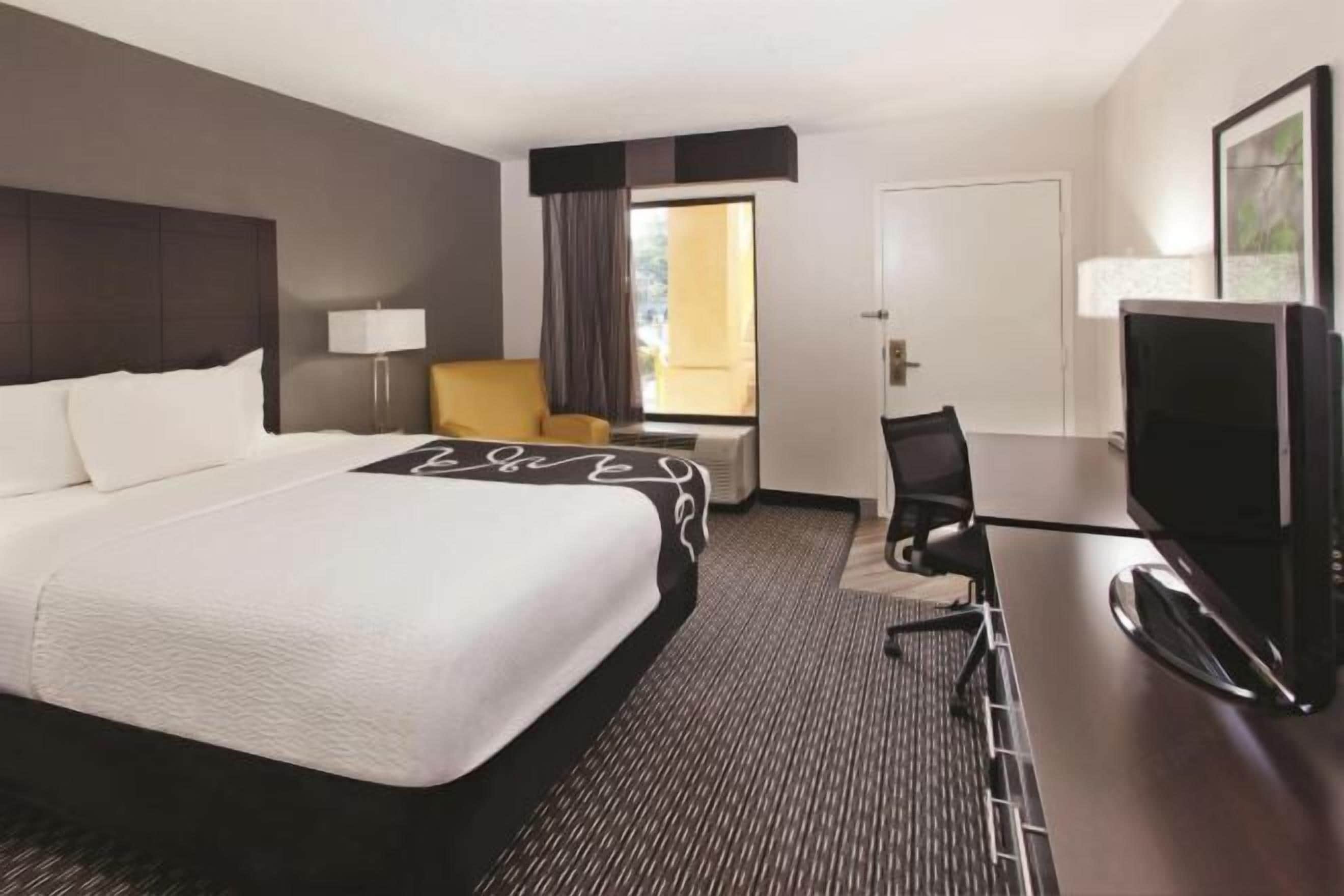 Premium bedding, pillow-top beds, desk, blackout curtains