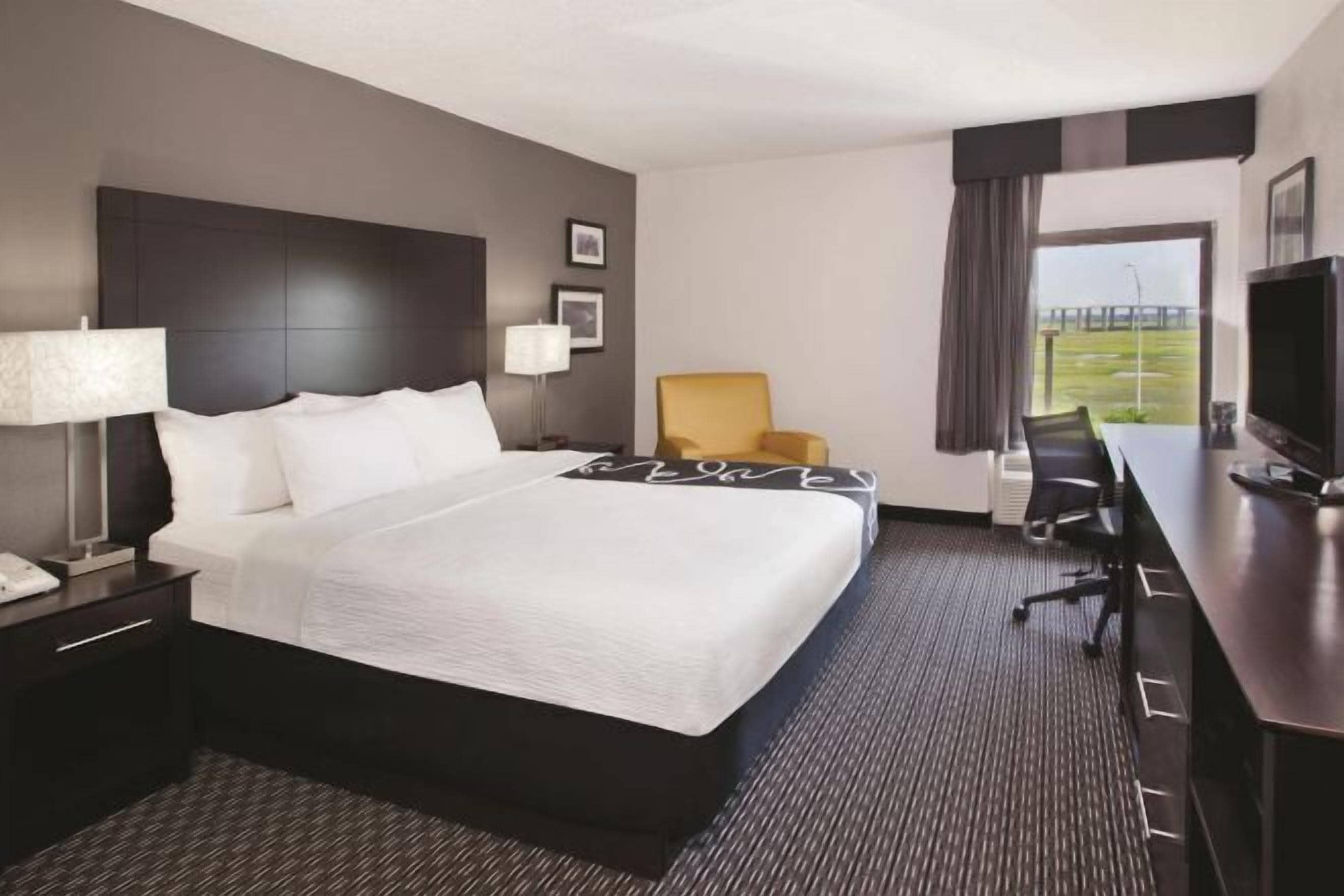 Premium bedding, pillow-top beds, desk, blackout curtains