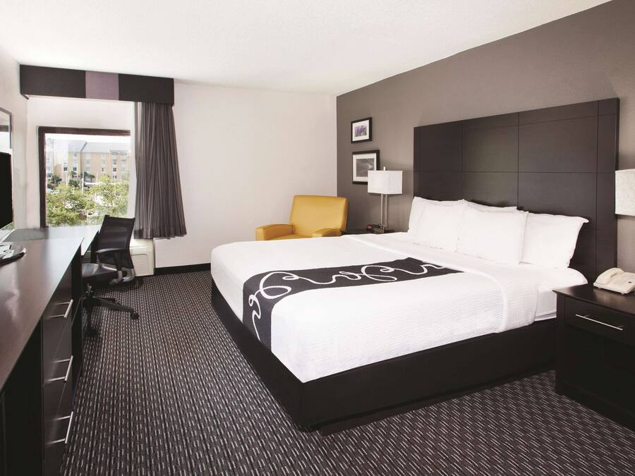Premium bedding, pillow-top beds, desk, blackout curtains