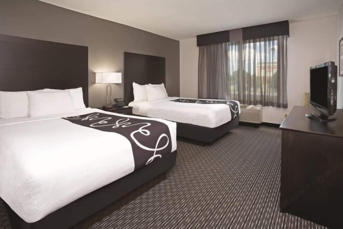 Premium bedding, pillow-top beds, desk, blackout curtains