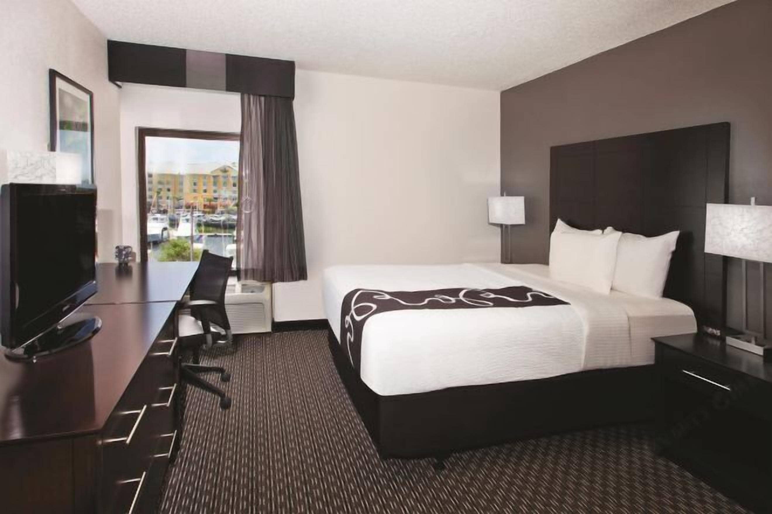 Premium bedding, pillow-top beds, desk, blackout curtains