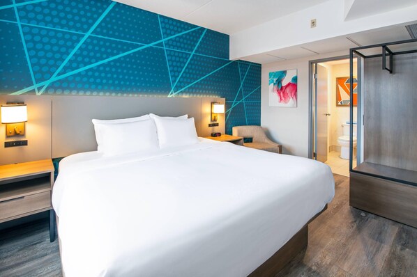 Suite, 1 Bedroom, Non Smoking (Master, 1 King Bed, 2-person Sofa Bed) | 1 bedroom, hypo-allergenic bedding, desk, laptop workspace