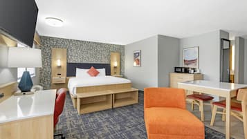 Suite, 1 King Bed, Non Smoking (Dining Table;Walk-in Shower) | Pillowtop beds, desk, laptop workspace, blackout drapes