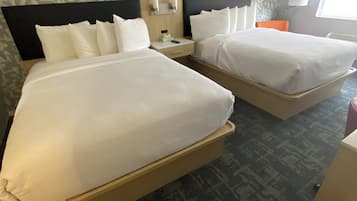 Pillowtop beds, desk, blackout drapes, iron/ironing board