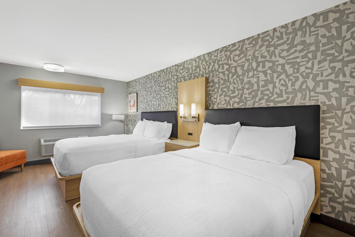 Standard Room, 2 Queen Beds, Non Smoking (Walk-in Shower;Pet Friendly) | Pillowtop beds, desk, laptop workspace, blackout drapes