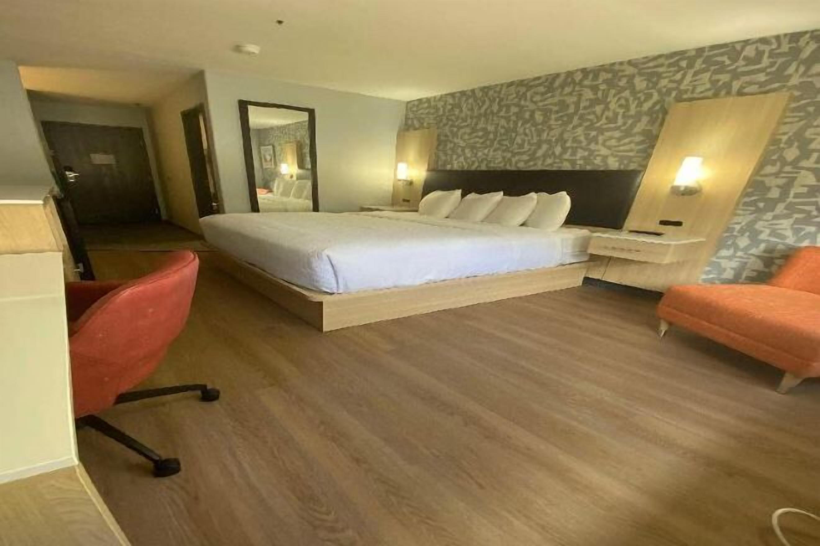 Pillow-top beds, desk, laptop workspace, blackout curtains