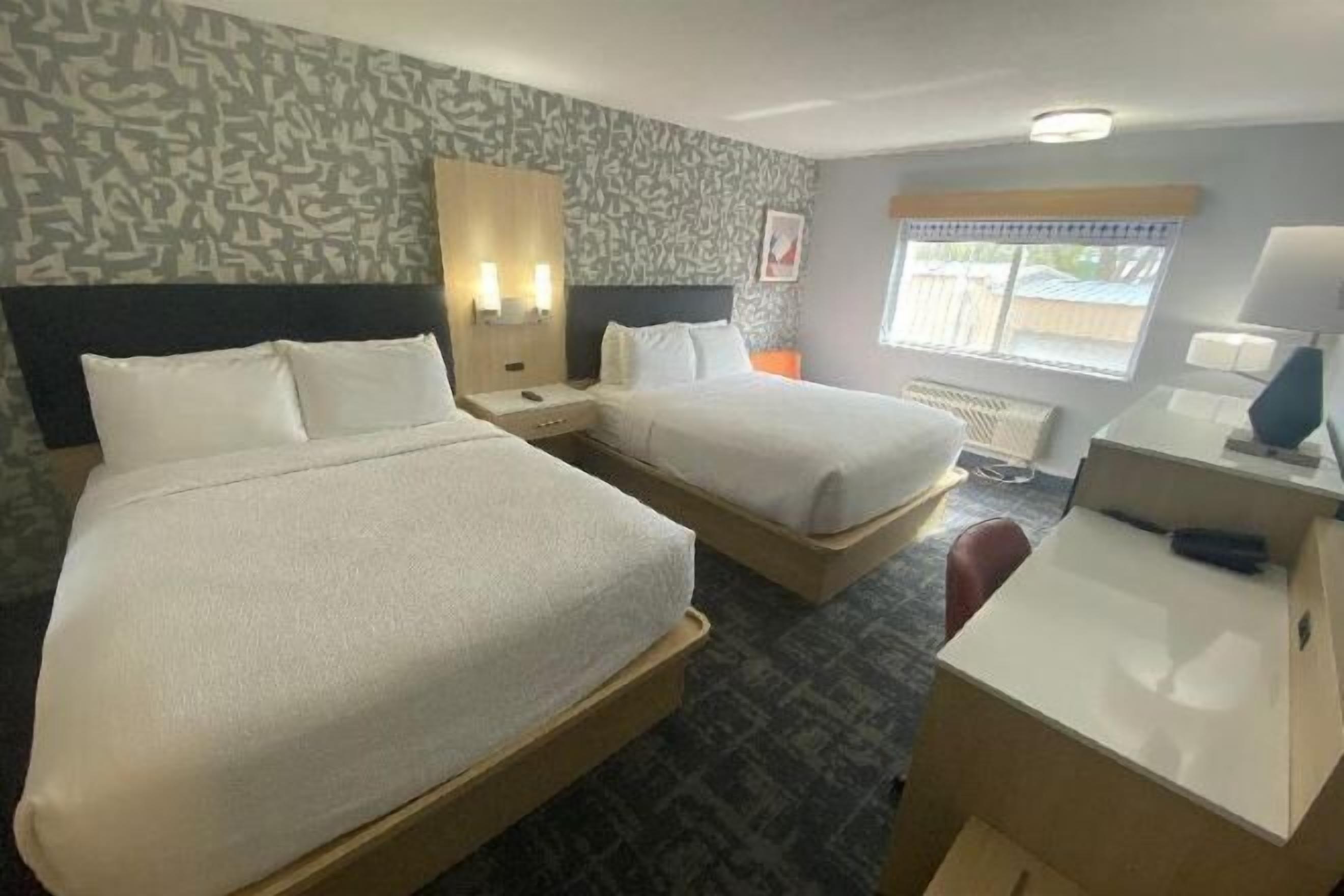 Pillowtop beds, desk, laptop workspace, blackout drapes